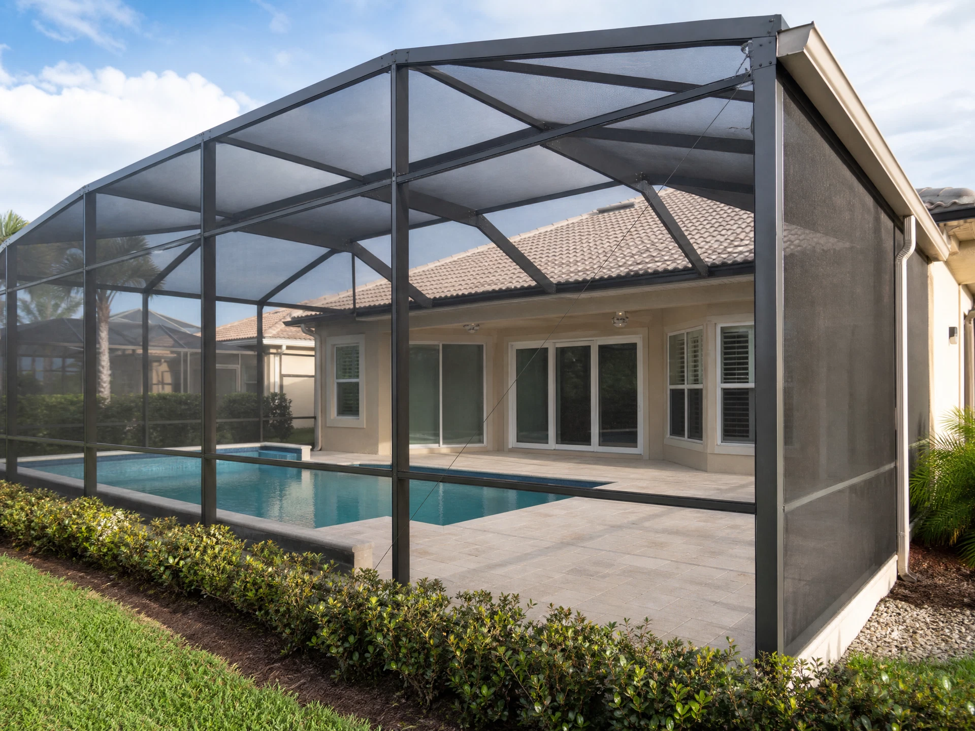 Temporary replacement image showing a screened lanai and pool enclosure for property documentation
